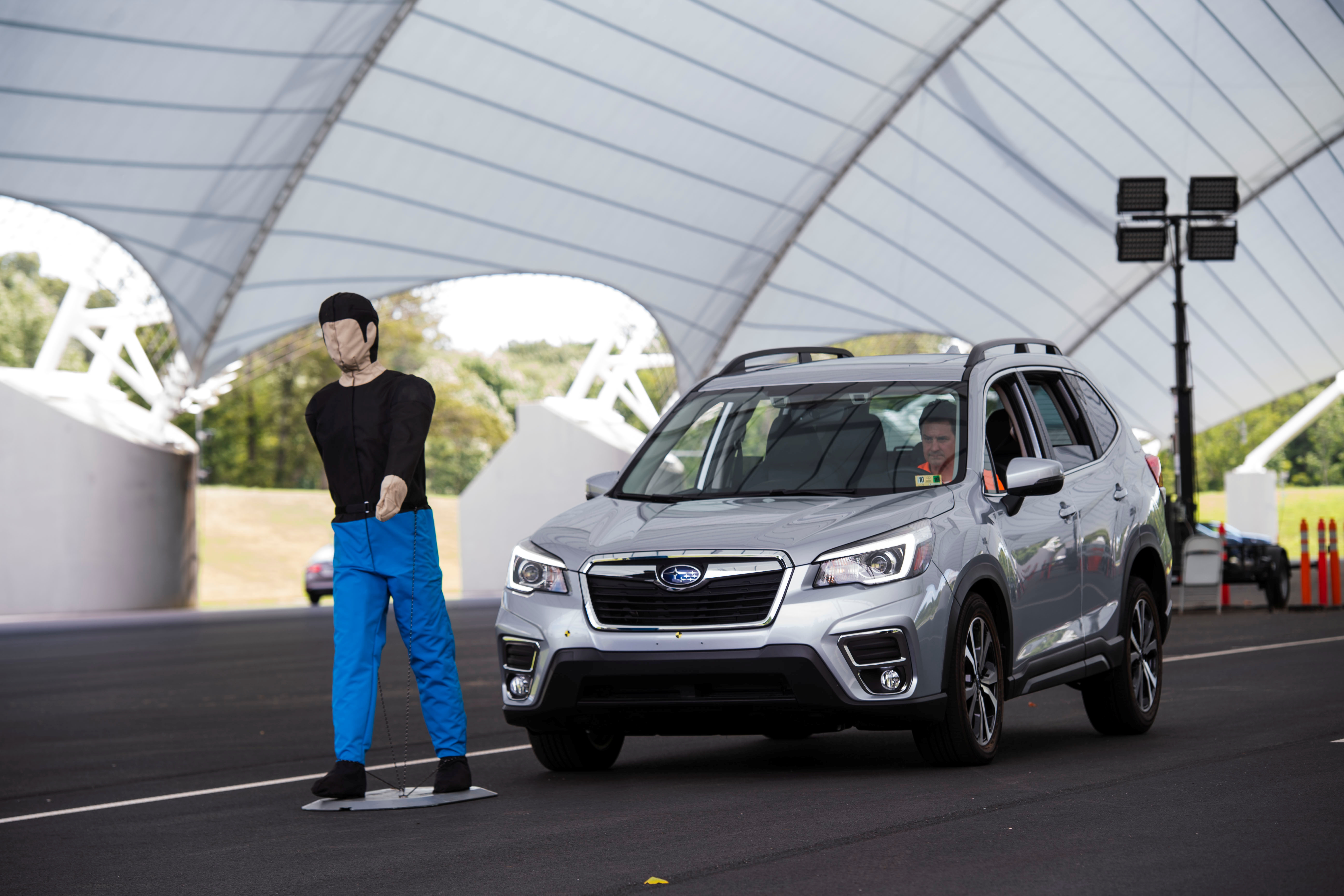 IIHS technician Floyd demonstrates pedestrian crash prevention test on Subaru Forester at IIHS-HLDI Vehicle Research Center in Ruckersville, Virginia