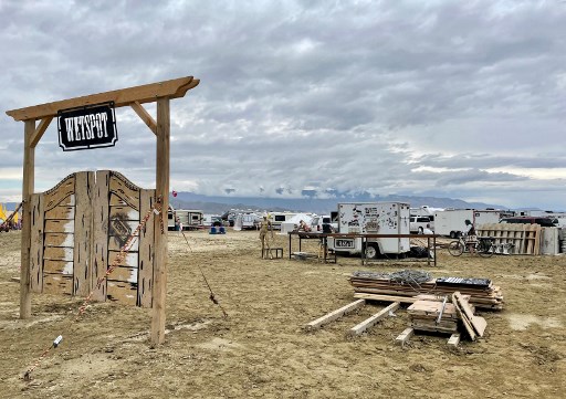 Thousands stuck in mud at Burning Man festival, one dead