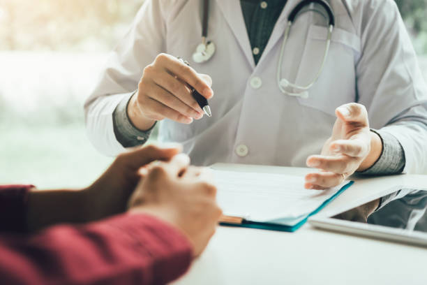 Doctor talking to the patient about menopause and treatment in future