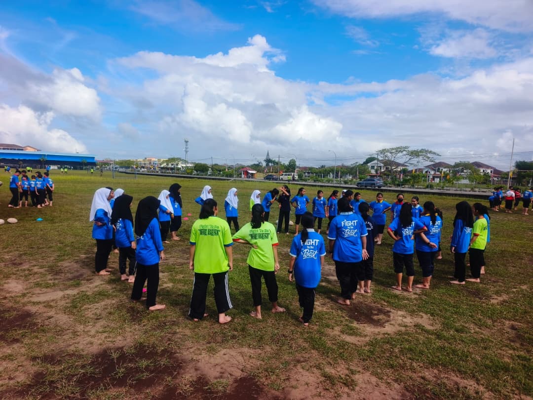 Girls take the field with confidence at SMK Merbau’s 'Get into Rugby' programme, breaking barriers in the sport.