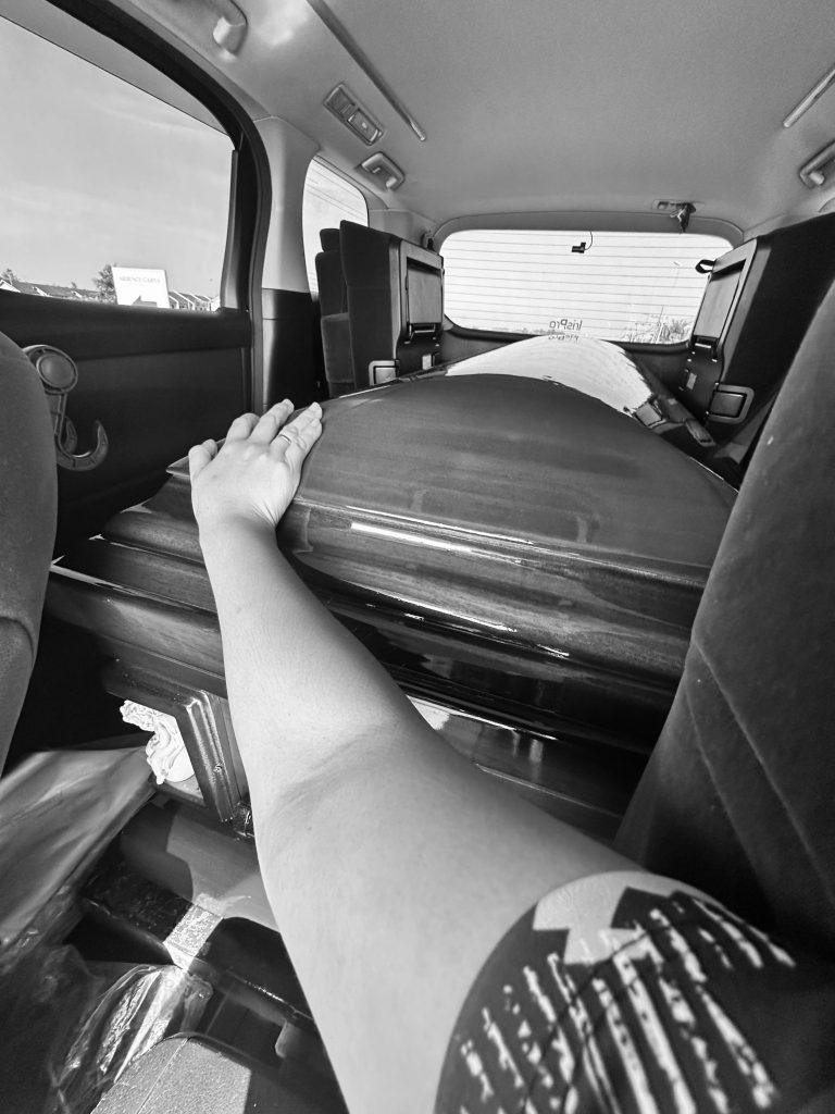 Wife of FDS victim Alexson accompanies him on final journey home