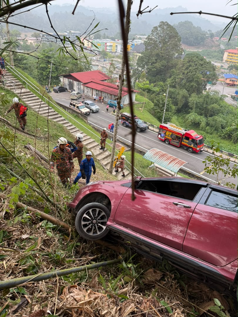 Woman cheats death as car plunges down hillside