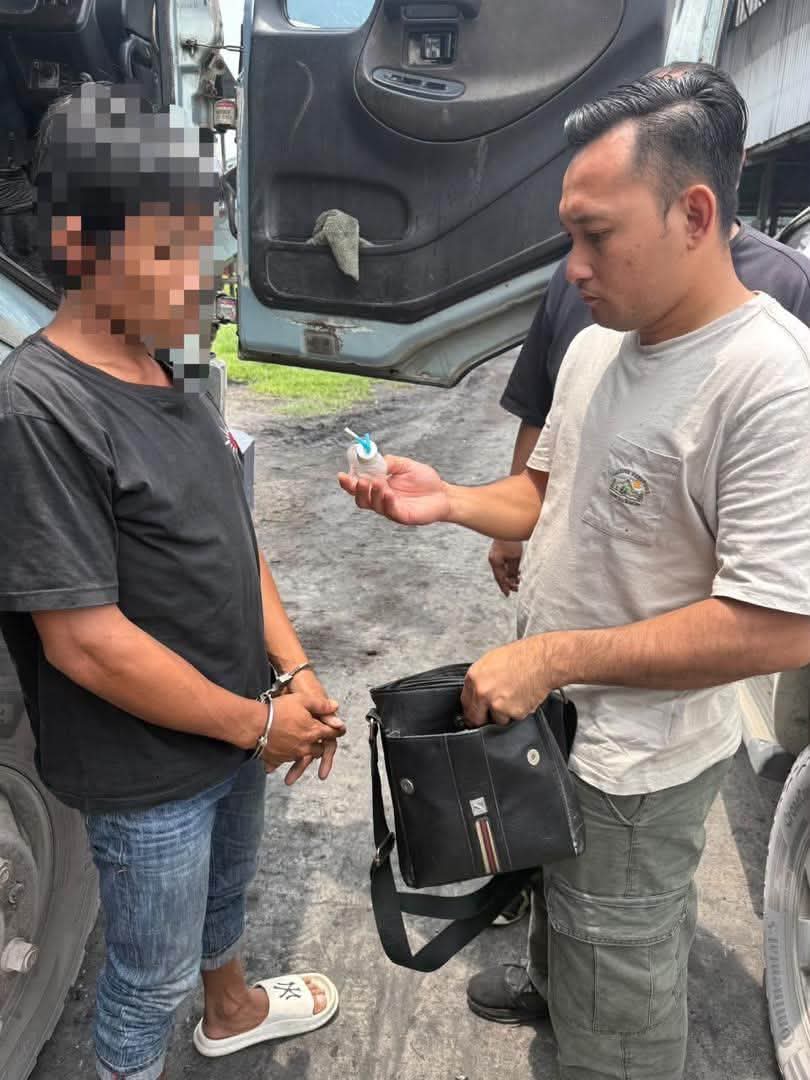Lorry driver held after drug paraphernalia found in bag