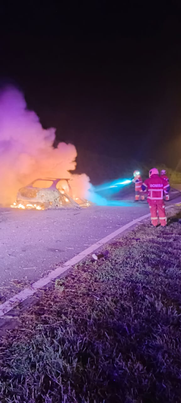 Luxury car destroyed in fire on Pan Borneo Highway